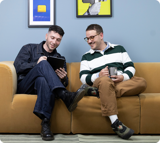 two men in a sofa
